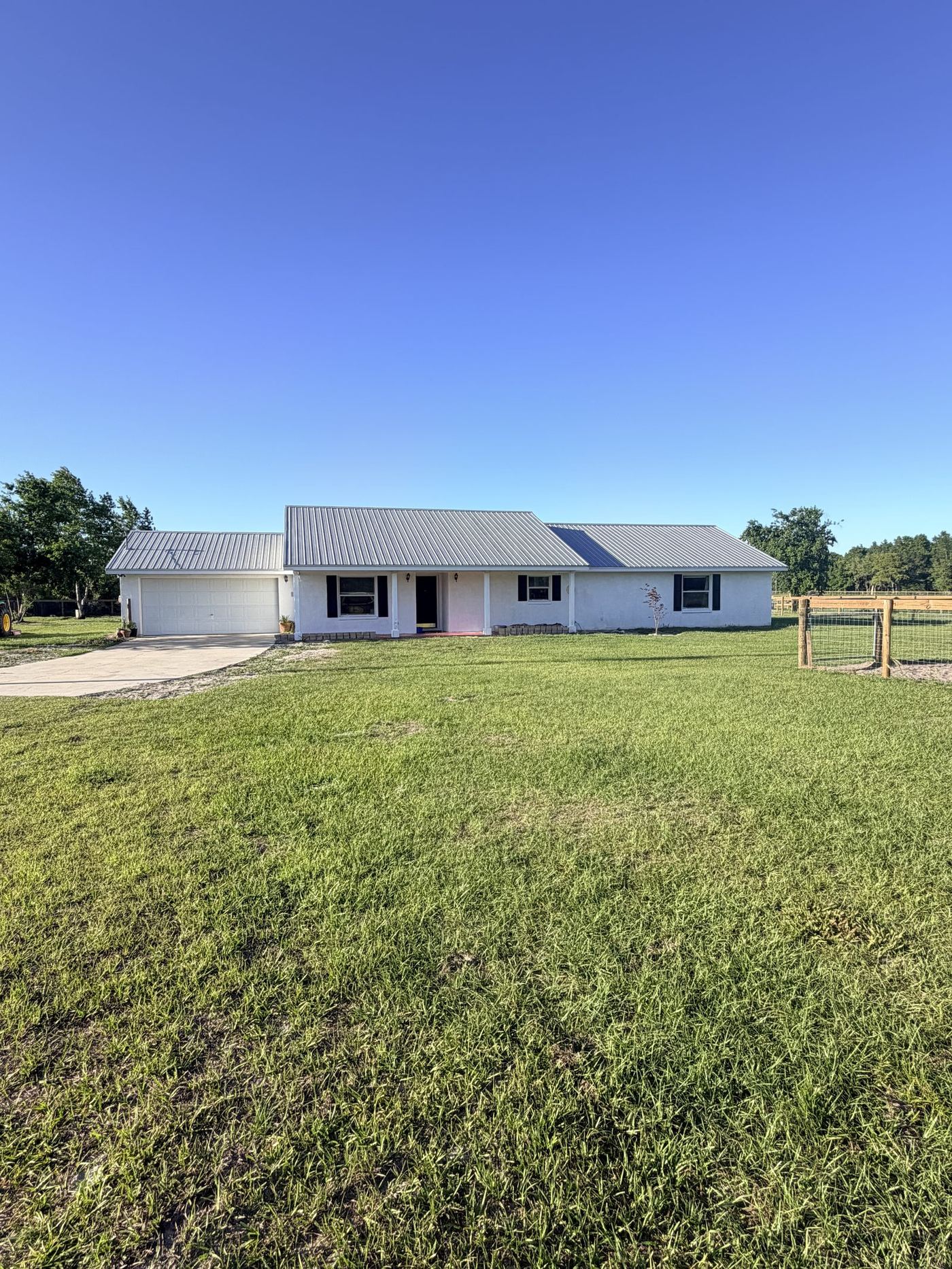 Front of home - concrete block with metal roof on 5 acres